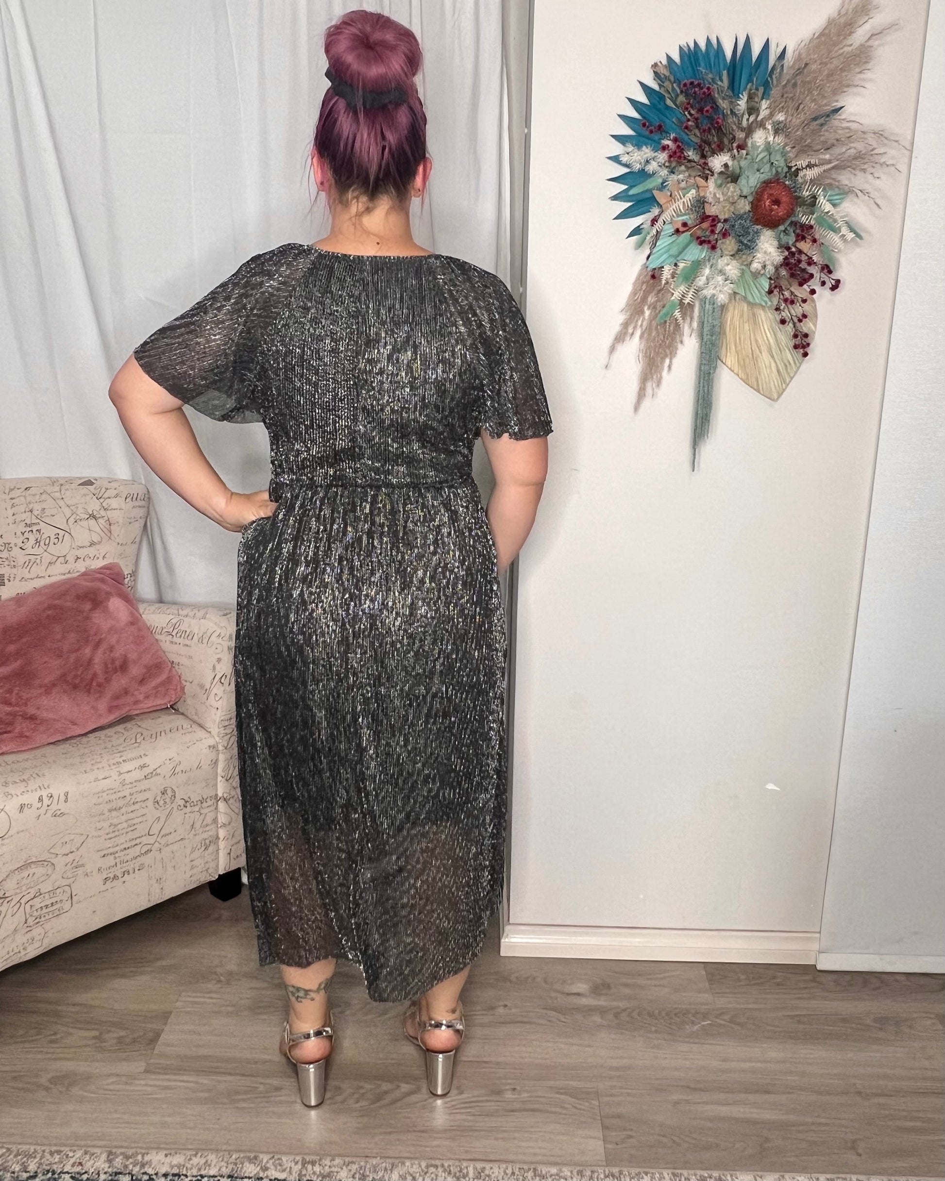 Nova Glitter Dress - Black | Peach the Label | This limited edition Nova Dress is the perfect way to stand out at your next night out! Crafted from 100% Polyester and designed with a splash of sparkle, this dress