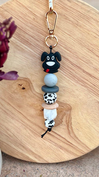 Oto & Iti Keyring | Oto & Iti | Add some personality to your keys or bag with a handmade keyring by Oto &amp; Iti
Features: 

Lobster claw
Silicone beads
Varied designs

Hardware: Varied - gold loo