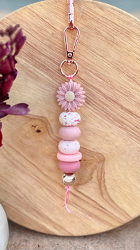 Oto & Iti Keyring | Oto & Iti | Add some personality to your keys or bag with a handmade keyring by Oto &amp; Iti
Features: 

Lobster claw
Silicone beads
Varied designs

Hardware: Varied - gold loo