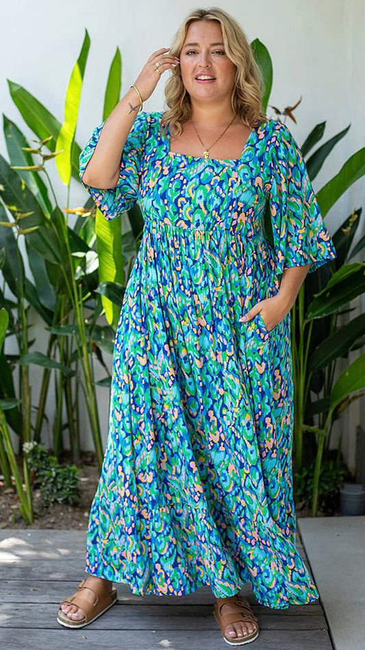 Kalani Dress: Our Kalani Dress is a summer show stopper! The print, the cut, the maxi length ... it is stunning. A flattering square cut neckline is complimented by a flowing slee - Ciao Bella Dresses 