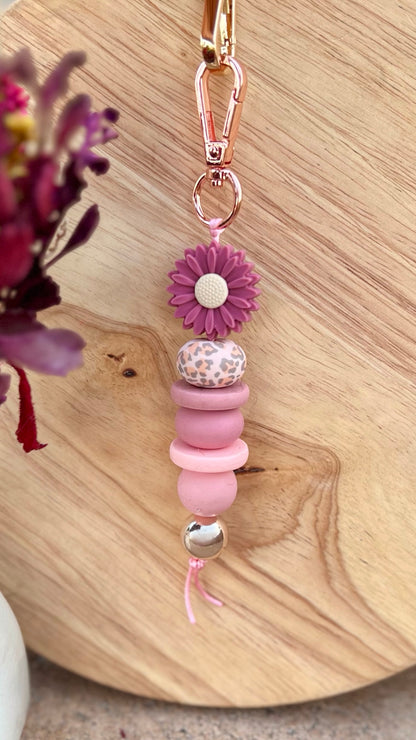 **NEW** Oto & Iti Keyring: Add some personality to your keys or bag with a handmade keyring by Oto &amp; Iti
Features: 

Lobster claw
Silicone beads
Varied designs

Hardware: Varied - gold loo - Ciao Bella Dresses 