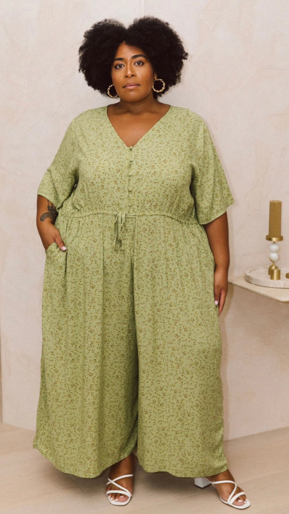 Morgan Jumpsuit - Green Wildflower | Peach the Label | Super fun, super floaty and creates an instant one-item outfit! We love how easy to wear this jumpsuit is with its versatile fit - cinch it in as much or as little a
