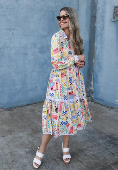 Rodeo Button Down Dress: 
The Rodeo print on a soft blush is pure joy.  The Button Down Dress is designed to skim over your curves and feel tapered but with enough #pastaspace
Features:

Con - Ciao Bella Dresses 