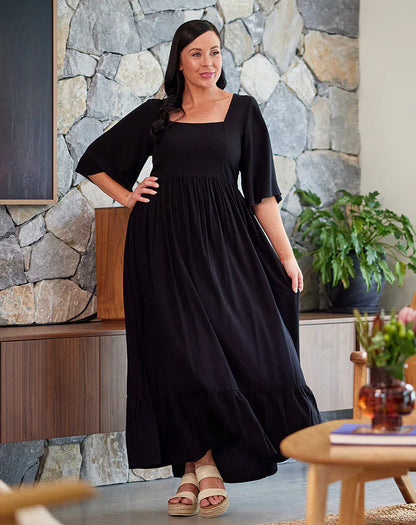 **NEW** Kalani Maxi Dress - Black | Bee Maddison | 
Our Kalani Dress is a summer show stopper! That print, the cut, the maxi length ... it is stunning. A flattering square cut neckline is complimented by a flowing sl