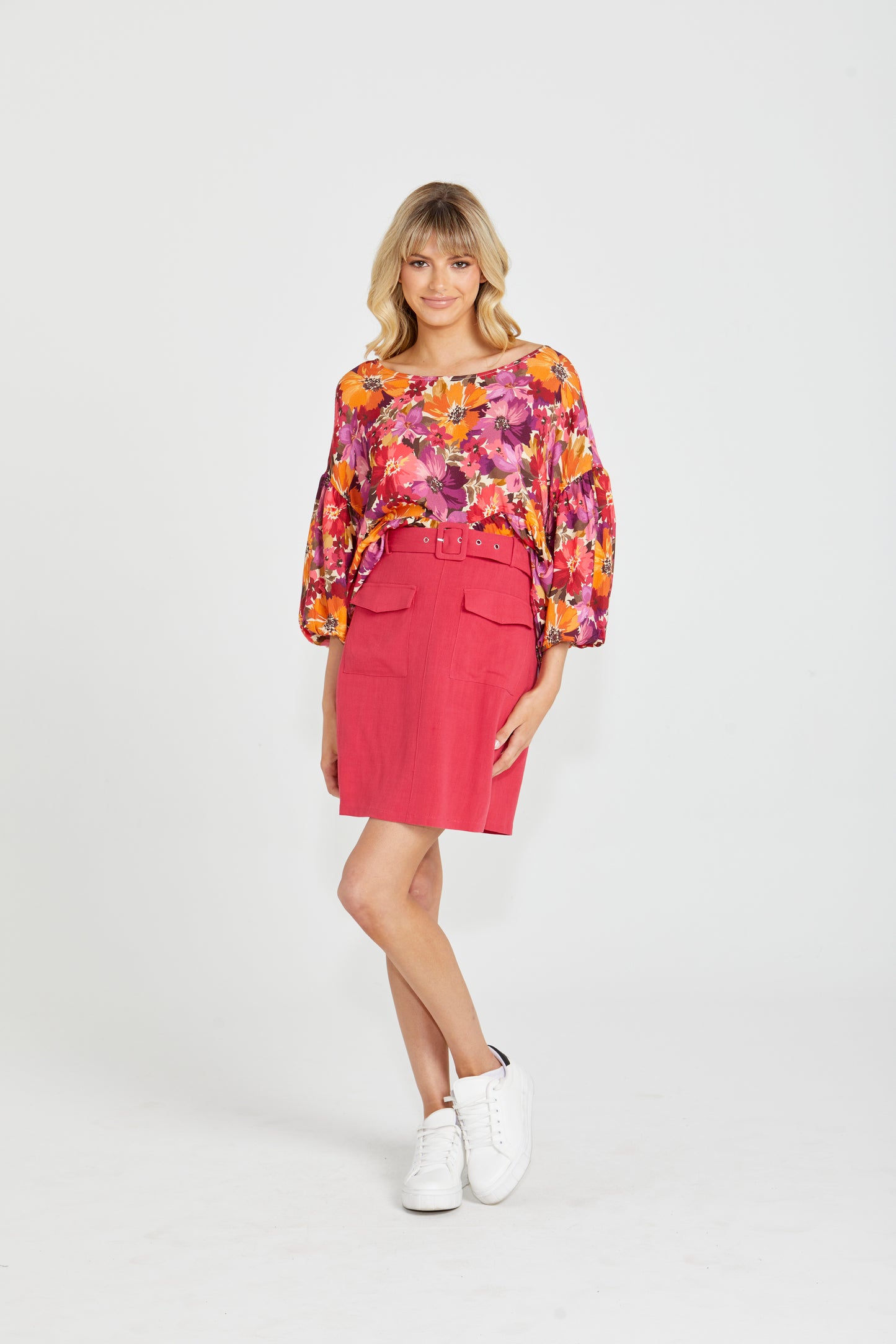 Roxanne Belted Mini Skirt:  
Introducing the Roxanne Belted Straight Silhouette - where style and functionality meet! With its classic straight silhouette, this dress offers a timeless and fla - Ciao Bella Dresses - Sass Clothing