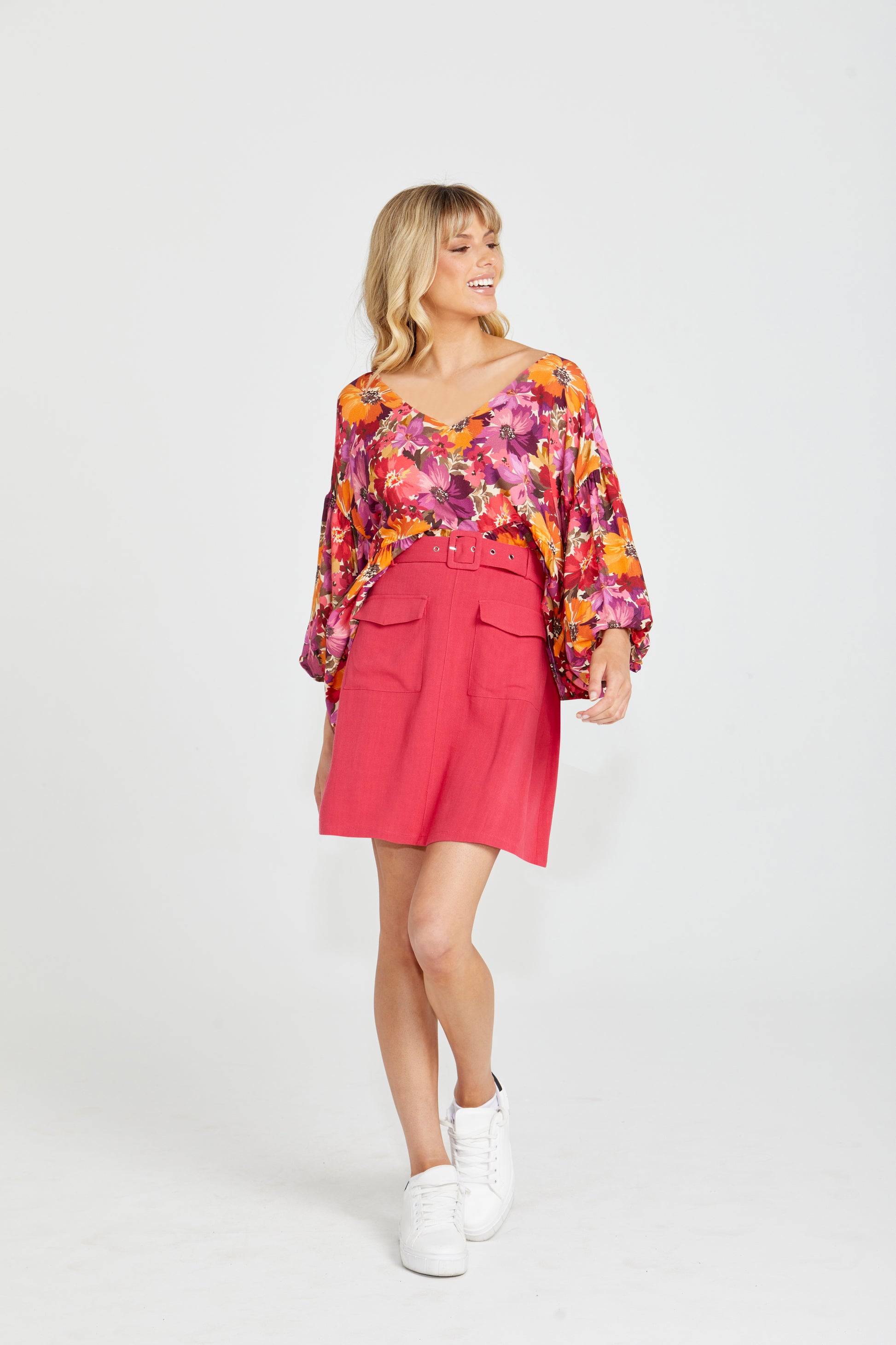 Roxanne Belted Mini Skirt | Sass Clothing |  
Introducing the Roxanne Belted Straight Silhouette - where style and functionality meet! With its classic straight silhouette, this dress offers a timeless and fla