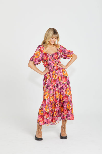 Yasmin Midi Dress - Berry Floral | Sass Clothing | Introducing the Yasmin Frill Hem Midi Dress! With its flirty frill hem and elasticated square neckline, it exudes confidence and grace. The back shirred panel ensure