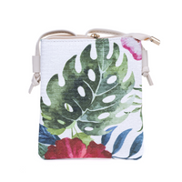 Crossbody Pouch Bag | IVYS | The perfect style upgrade can be found with the Crosshatch Tassel Crossbody Bag. Choose your ideal shade from our range and don't be afraid to flaunt it. This purse 