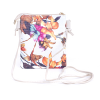 Crossbody Pouch Bag | IVYS | The perfect style upgrade can be found with the Crosshatch Tassel Crossbody Bag. Choose your ideal shade from our range and don't be afraid to flaunt it. This purse 