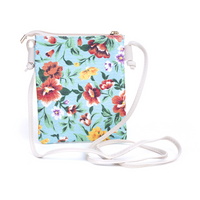 Crossbody Pouch Bag | IVYS | The perfect style upgrade can be found with the Crosshatch Tassel Crossbody Bag. Choose your ideal shade from our range and don't be afraid to flaunt it. This purse 