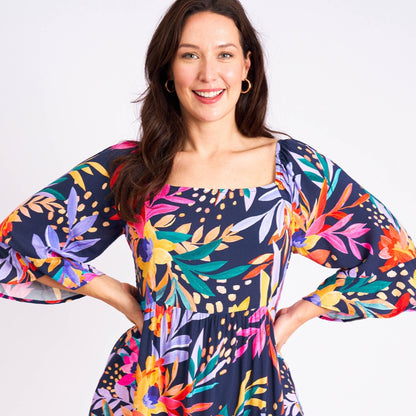 Jolene Midi Dress: An elegant midi dress, the Jolene pairs a beautiful midi shape with a vibrant floral print, creating this beautiful piece
Features:

Bell sleeves
Midi length
Inner s - Ciao Bella Dresses 