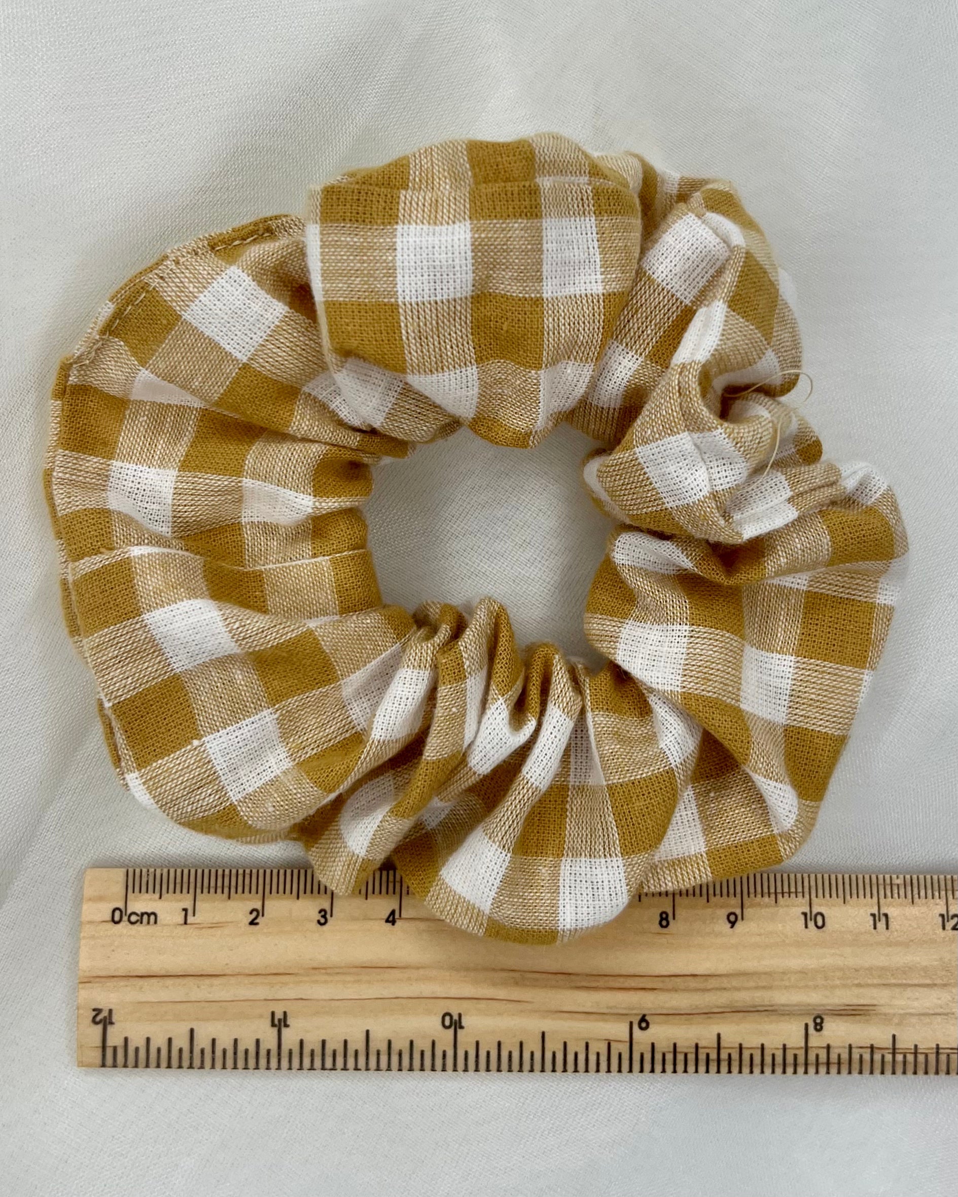 Sage + Stone Handmade Neutral Boho Scrunchies: Hand made in Bunbury WA by Sage + Stone, these beautiful pieces bring a sweet neutral boho vibe to your wardrobe

Handmade with various fabrics
Please see photos for - Ciao Bella Dresses 