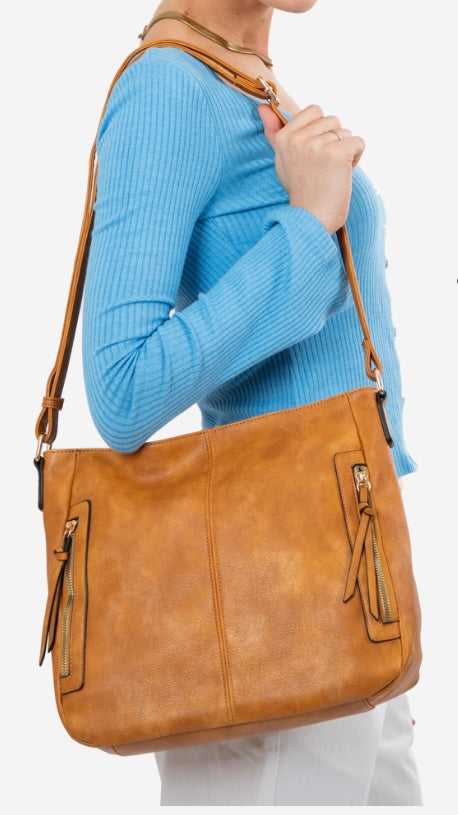 Lizzie Shoulder Bag | Sassy Duck | A box style shape with two zip features on the front. A simple design made for the on-the-go gal. Long tassels adorn the zips and lead to two large front pockets. An