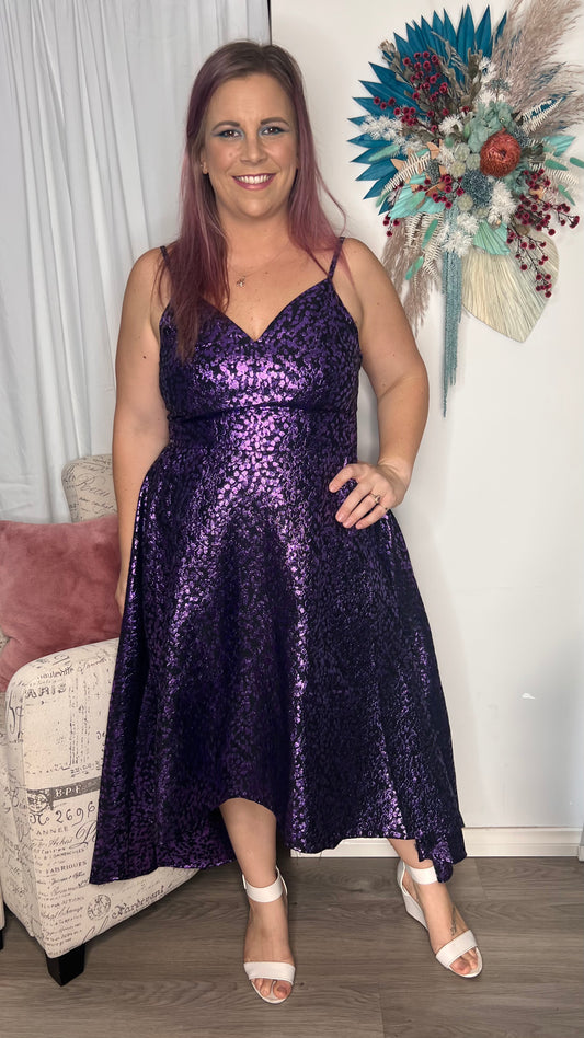 Aubrey Foil Print Cocktail Dress: The Aubrey Dress is sure to turn heads at your next evening event, with the foil print throwing just a hint of sass. It is a high low style dress with a structure to - Ciao Bella Dresses 
