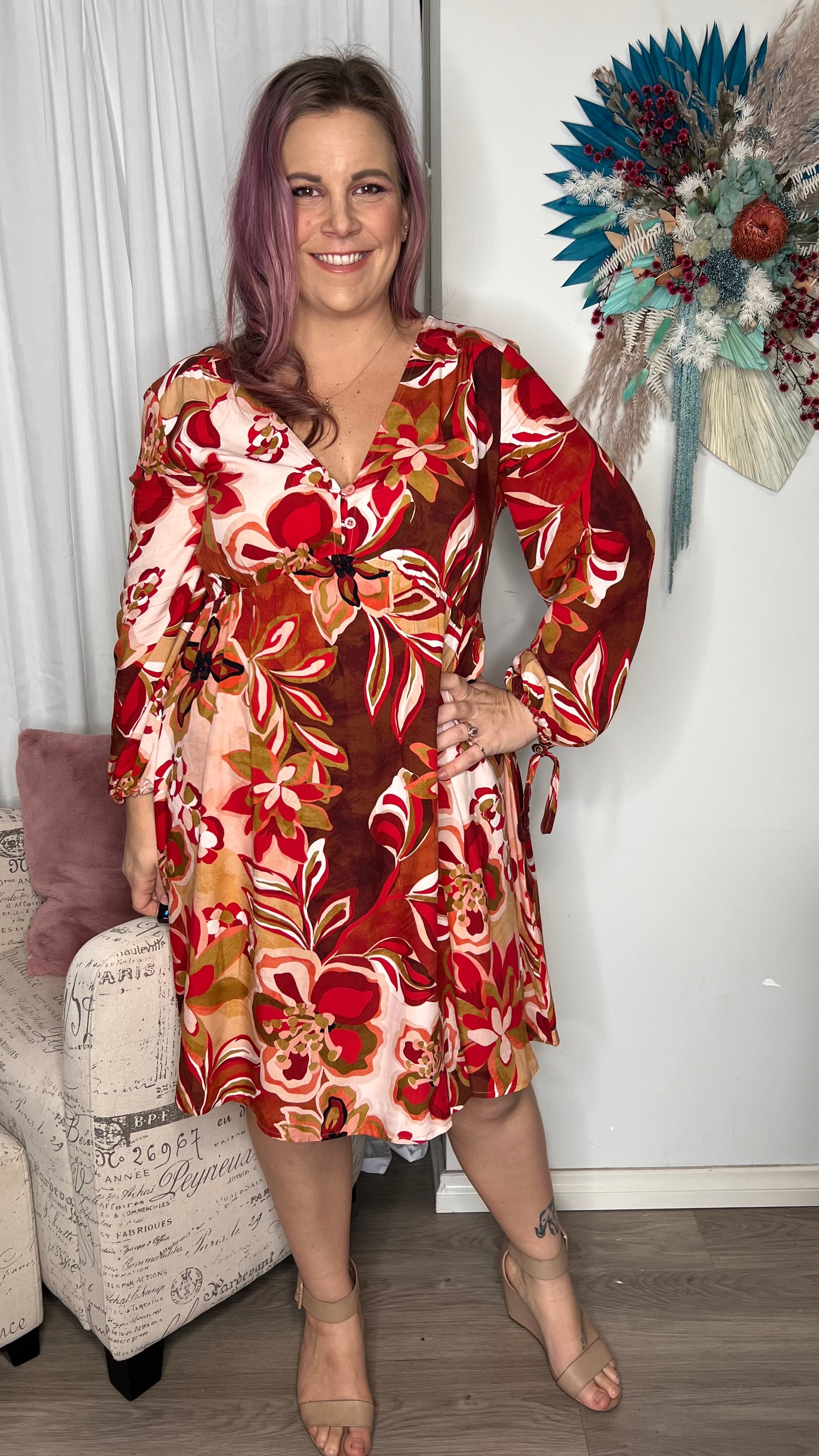 Yasmin Secret Garden Dress: The Yasmin Secret Garden Dress is the perfect addition to your winter wardrobe. Featuring a beautiful floral print, cute detailing at the bust and wrists in a drop w - Ciao Bella Dresses 