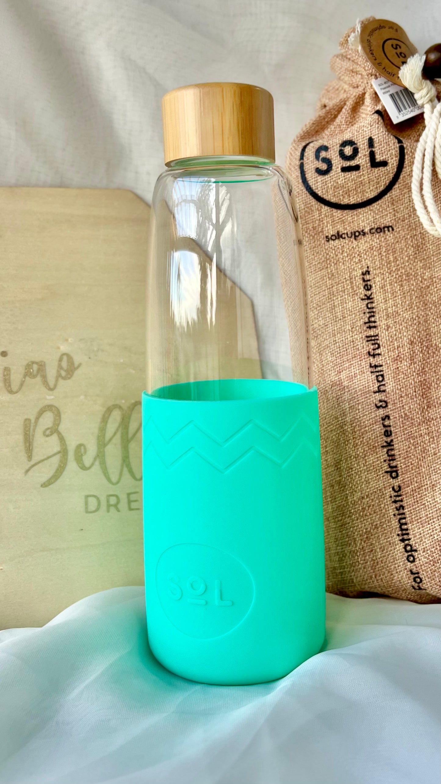 SoL Water Bottle: Enjoy the pure taste of water in a hand blown glass bottle that's reusable, easy to carry and comes in a range of sizes and colours.
Our Large beautiful SoL Bottles  - Ciao Bella Dresses 