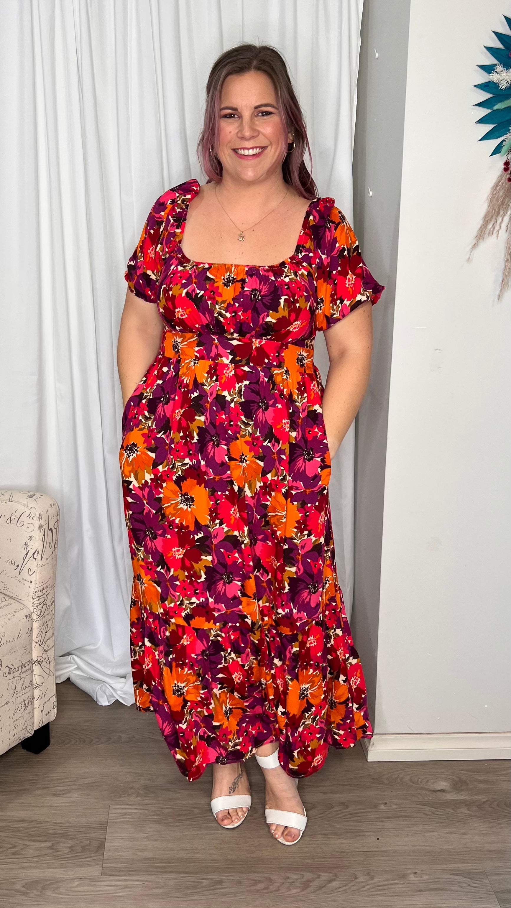 Yasmin Midi Dress - Berry Floral | Sass Clothing | Introducing the Yasmin Frill Hem Midi Dress! With its flirty frill hem and elasticated square neckline, it exudes confidence and grace. The back shirred panel ensure