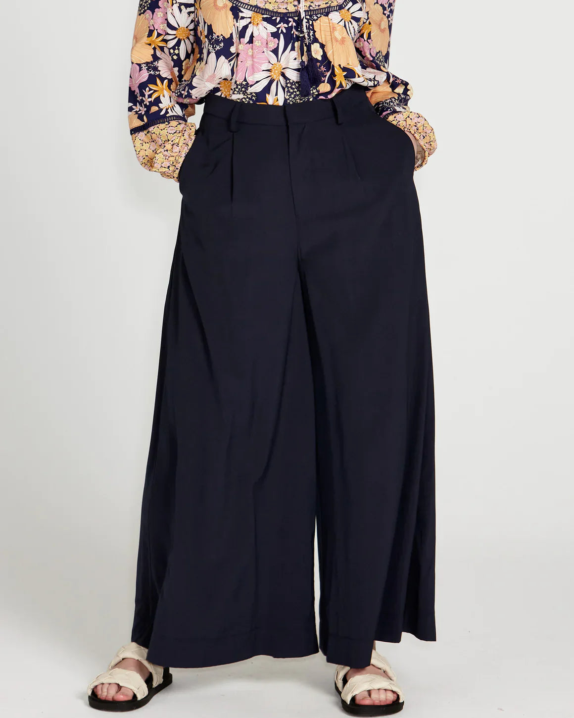 Lillian Palazzo Pants - Navy | Sass Clothing | The Lillian Palazzo Pants are a stunning shape to take you from office to after hours, year round. The pleats at the top streamline into a wide leg for the utmost in