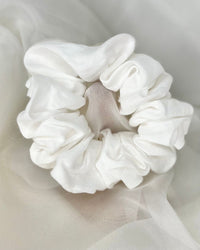 Sage + Stone Handmade Neutral Boho Scrunchies | Sage + Stone | Hand made in Bunbury WA by Sage + Stone, these beautiful pieces bring a sweet neutral boho vibe to your wardrobe

Handmade with various fabrics
Please see photos for