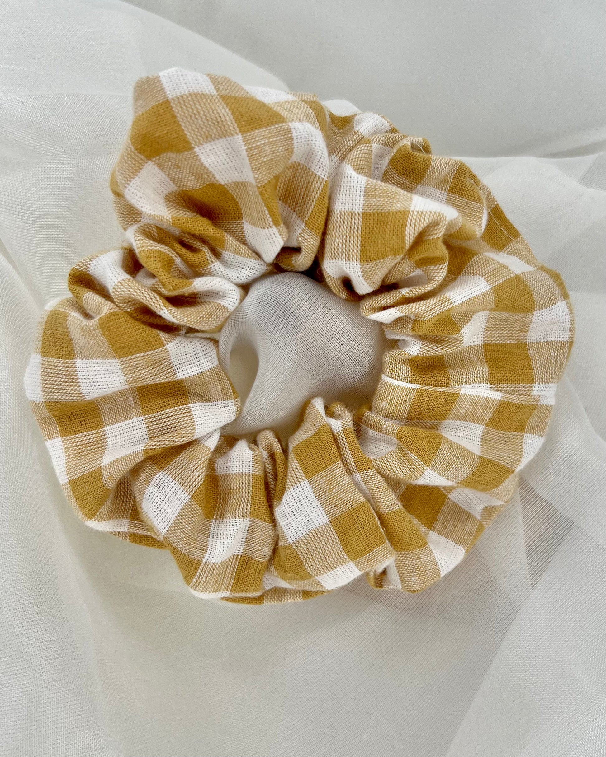 Sage + Stone Handmade Neutral Boho Scrunchies: Hand made in Bunbury WA by Sage + Stone, these beautiful pieces bring a sweet neutral boho vibe to your wardrobe

Handmade with various fabrics
Please see photos for - Ciao Bella Dresses 