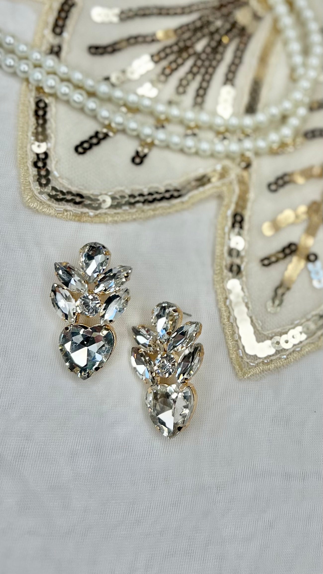 Gatsby Earrings - Heart Drops: Shop our stunning range of Gatsby inspired dangle earrings. Each pair is decorated with rhinestones ready to help you sparkle the night away
Material: alloy
Length:  - Ciao Bella Dresses 