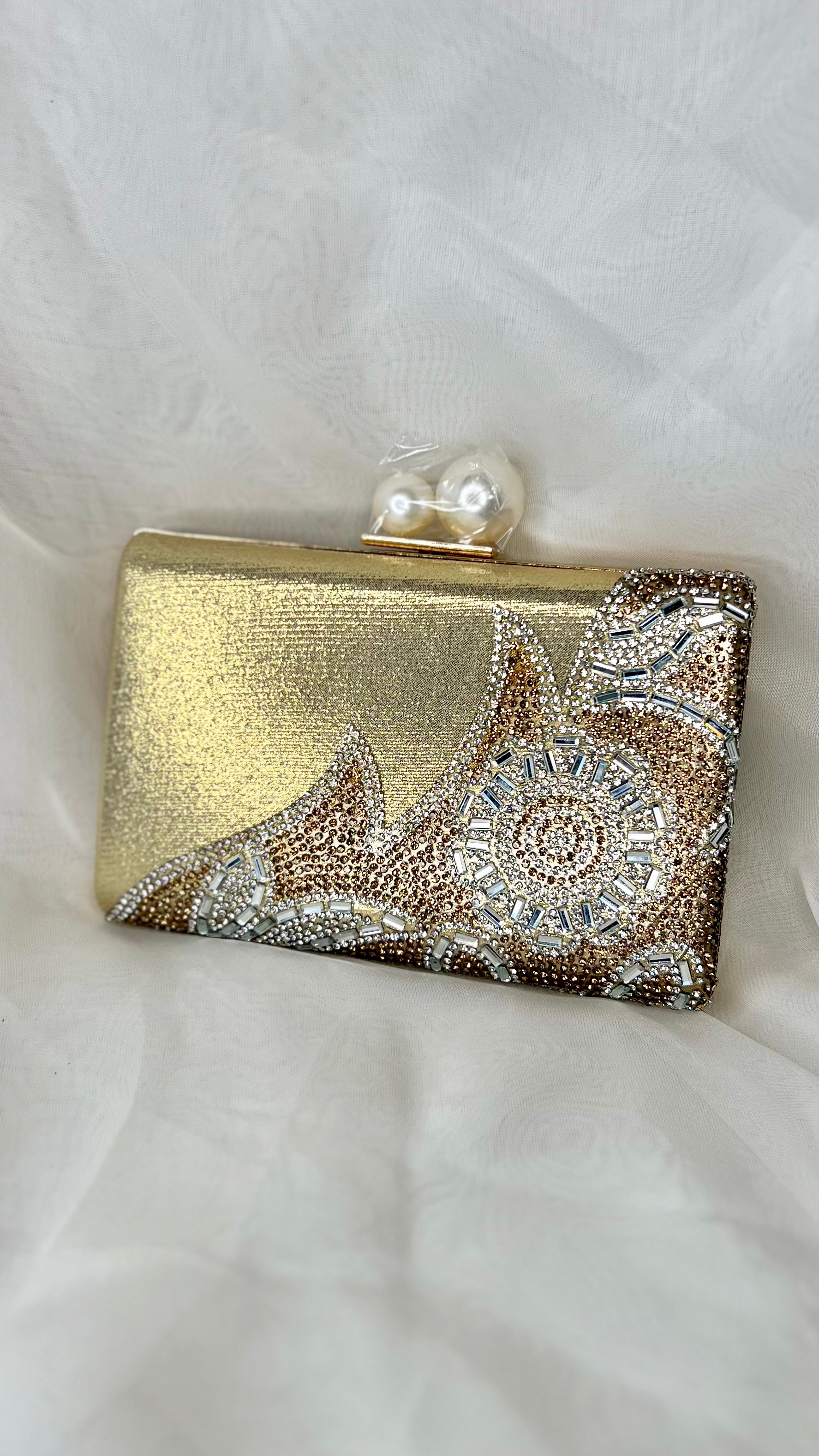 Baguette Evening Bag: Unusual and eye catching, this convertible clutch bag is also lovely to hold.
Dimensions: W 17cm X D 4.5cm X H 11.5cm
Handle Drop: Gold link chain extends to 116cm,  - Ciao Bella Dresses 