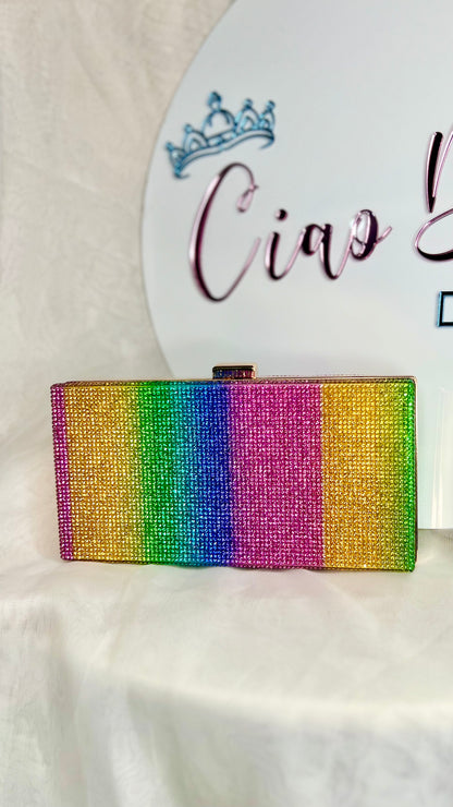Alina Evening Bag: The Alina Evening Bag has all the colour and sparkle one could dream of. This bag will bring any outfit to life
Features:

Top clasp
Gorgeous block rainbow pattern
T - Ciao Bella Dresses 