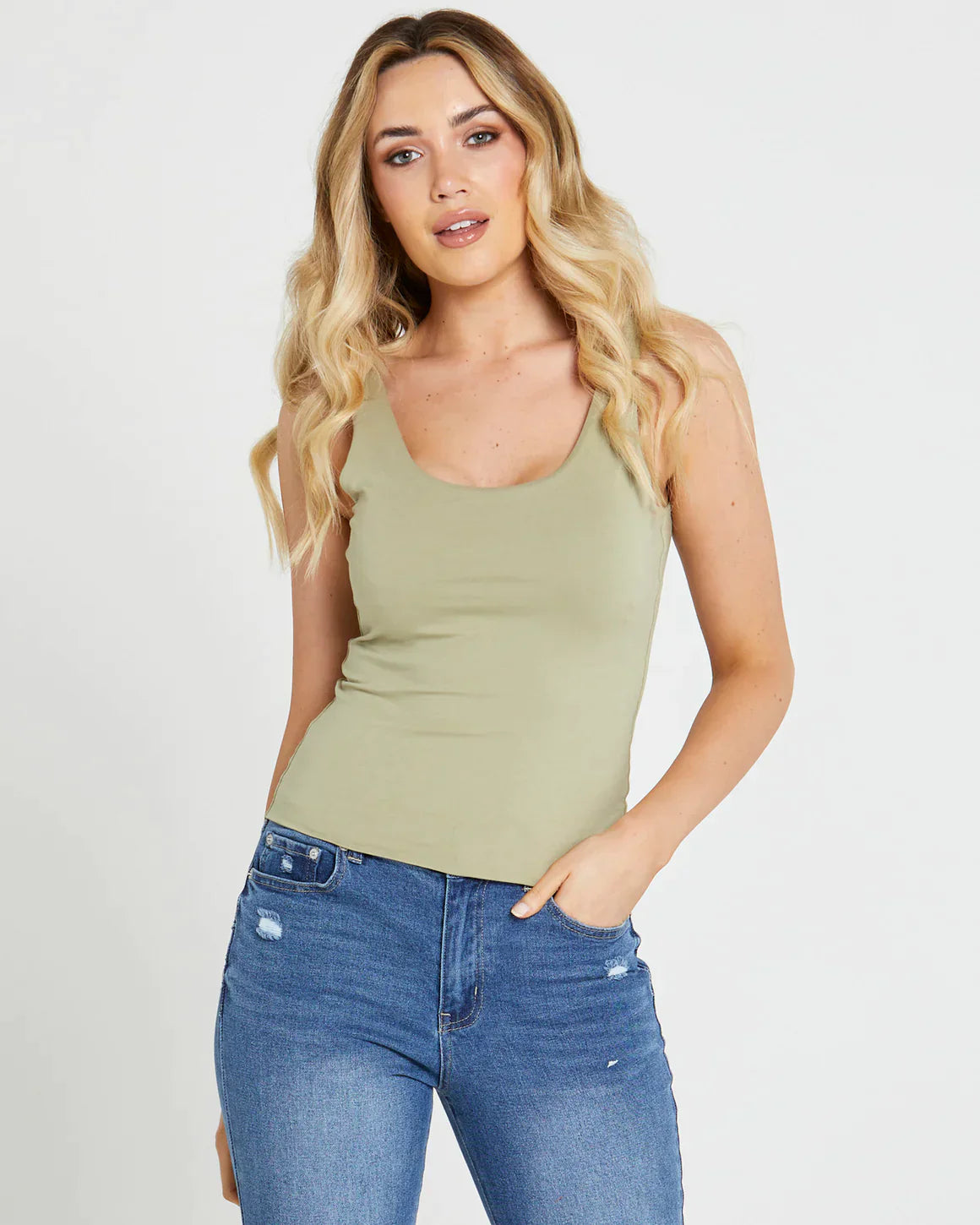 Cassie Singlet Tank - Sage | Sass Clothing | Introducing the Cassie Singlet. From errands to "out”, this singlet's stylish and sassy design shows off your curves without skimping on comfiness. A basic that pack