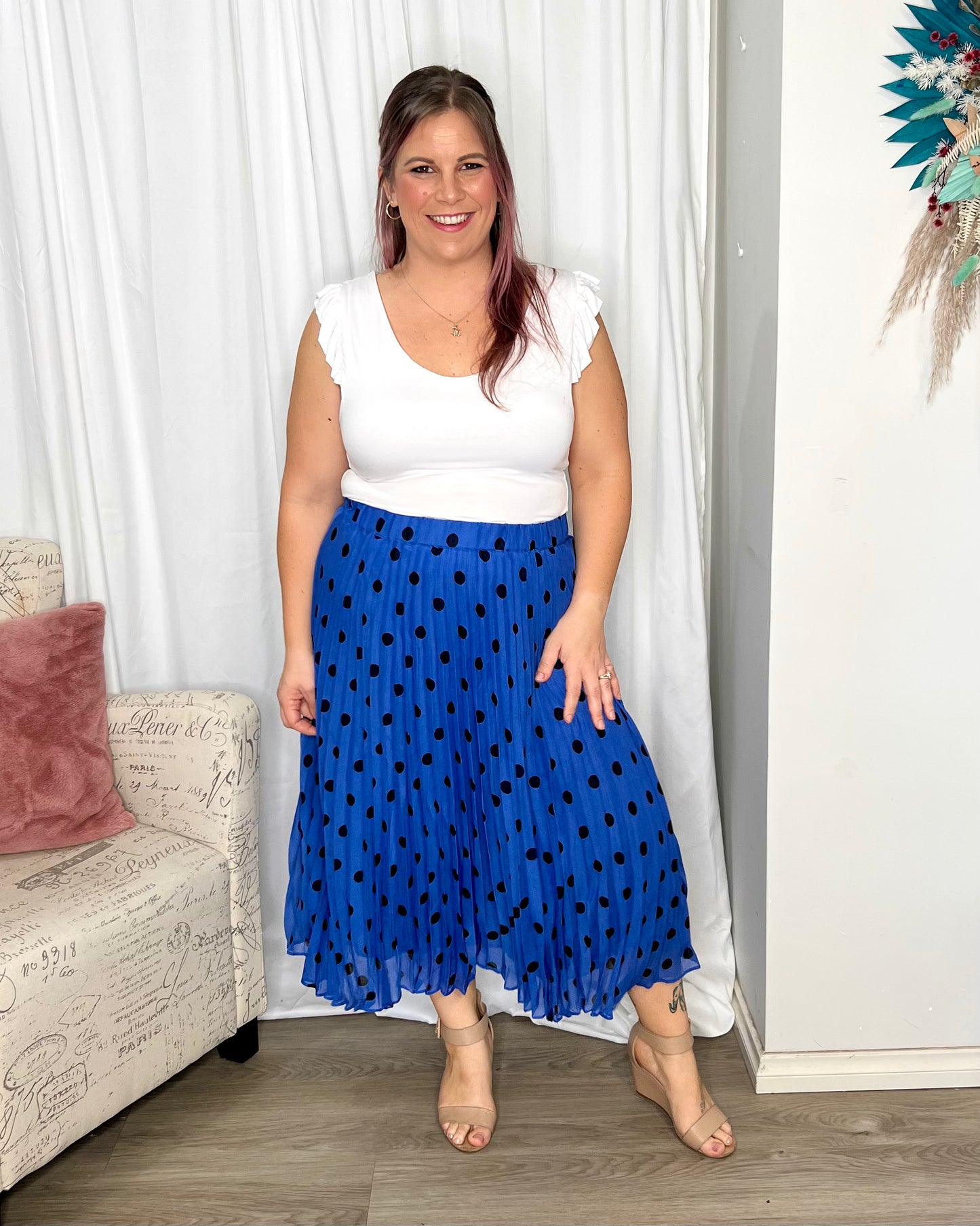 Chanell Pleated Skirt | Betty Basics | 
Introducing the Chanel Pleated Skirt, the epitome of fun and laid-back style! With its elastic waistband, this skirt ensures a comfortable and perfect fit for all-d