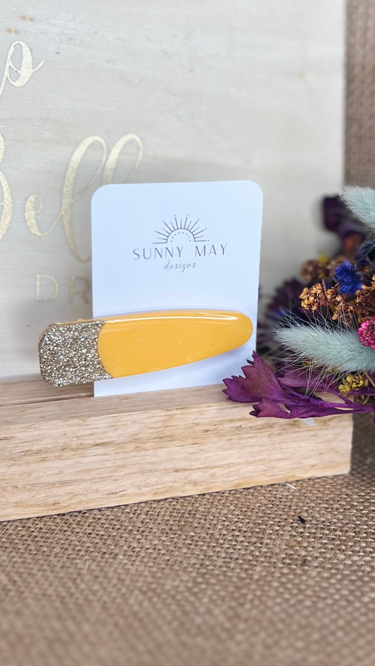 Sunny May Hair Clips: These hair slides are handmade from a delightful mix of colours and glitter, creating the perfect mix of vibrant colour and shine to brighten up your outfit
These go - Ciao Bella Dresses 