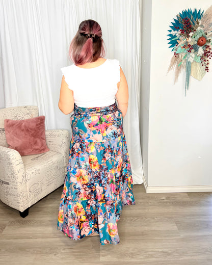 Pure Shores Shirred Boho Skirt | Fate + Becker | Introducing the Pure Shores Shirred Boho Skirt, a stunning embodiment of elegance and versatility. Adorned with a gorgeous teal bouquet pattern, this skirt is a true