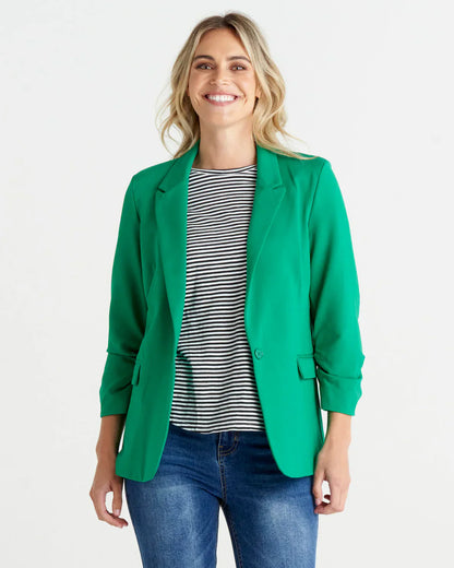 Merci Ponte Blazer - Green | Betty Basics | Introducing the Ponte Blazer, where comfort meets style with a fun and laid-back twist! Made with a soft stretch hand feel, this blazer is designed to keep you feeli