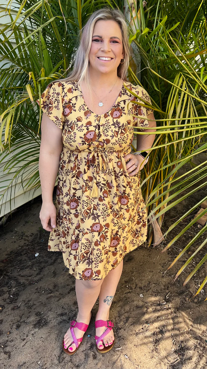 Milla Dress: This sweet little boho dress is such an easy “chuck on and go” style that will make you feel oh so pretty

Functional buttons at bust
Drawstring waist
Prewashed rayo - Ciao Bella Dresses 