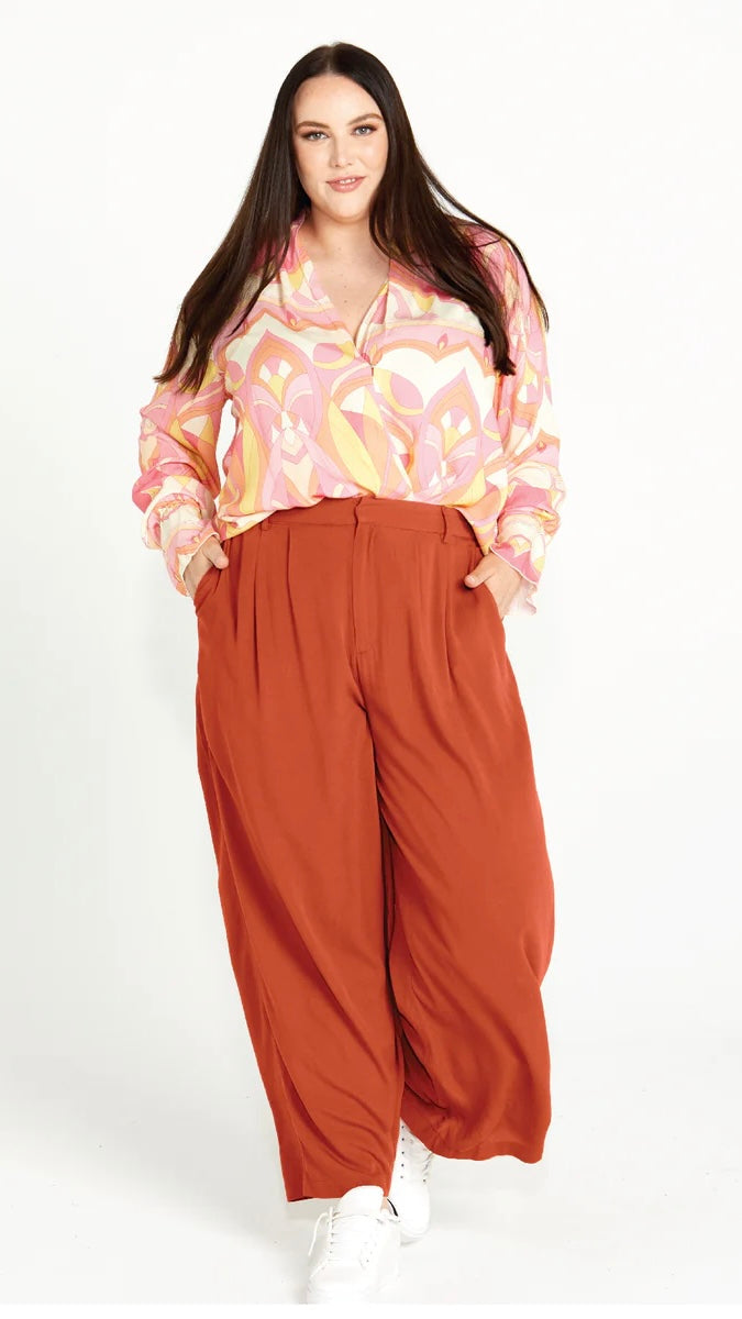 Vivienne Wide Leg Pants - Terracotta | Sass Clothing | Step into style and comfort with the Vivienne Wide Leg Pant! Featuring soft tailoring and a chic, wide leg design, these pants are the perfect choice for keeping you