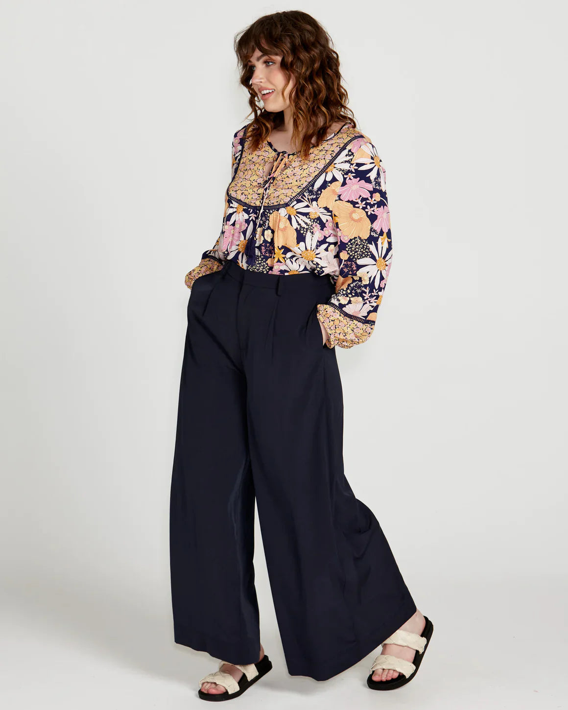 Lillian Palazzo Pants - Navy | Sass Clothing | The Lillian Palazzo Pants are a stunning shape to take you from office to after hours, year round. The pleats at the top streamline into a wide leg for the utmost in