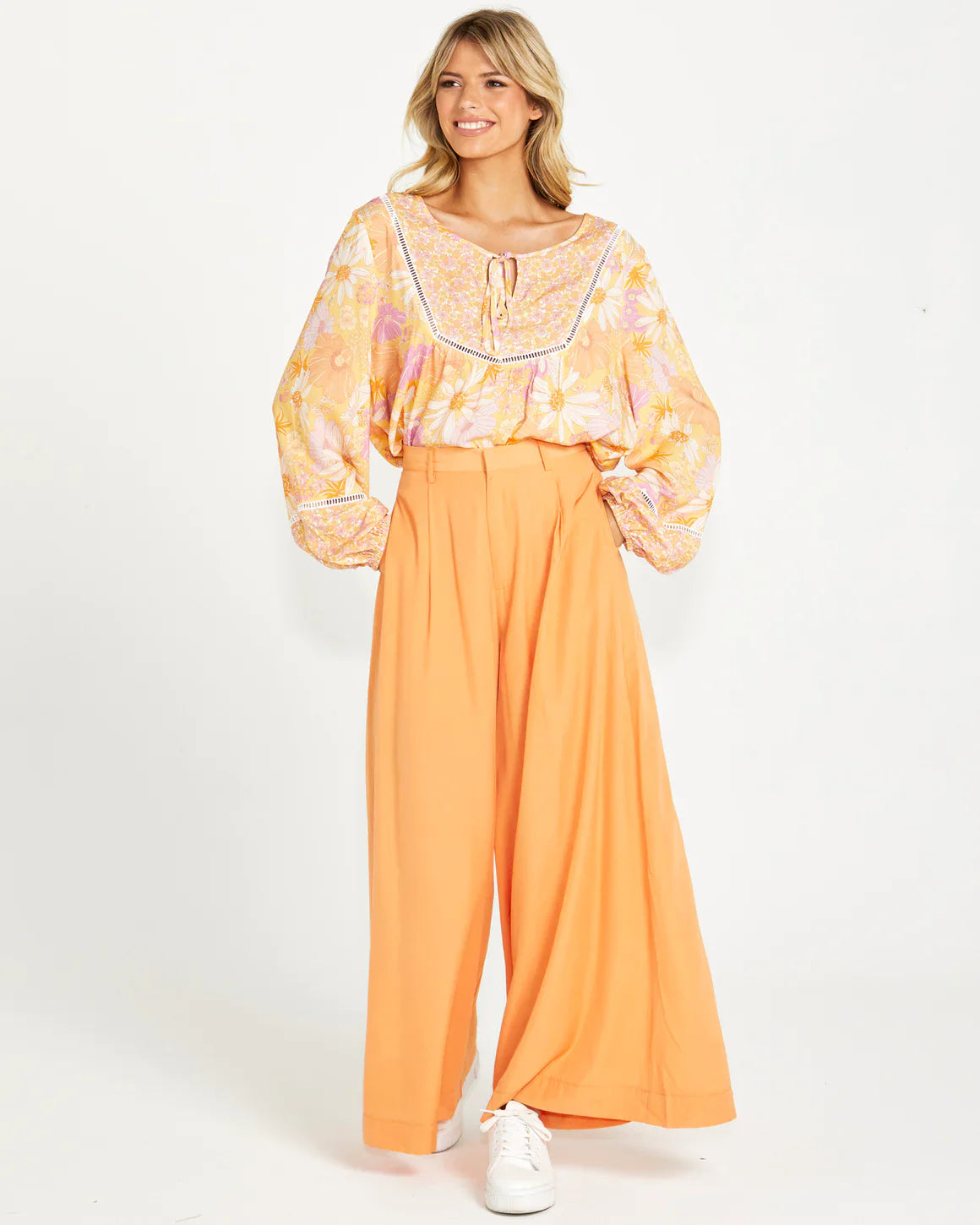 Lillian Palazzo Pants - Melon | Sass Clothing | The Lillian Palazzo Pants are a stunning shape to take you from office to after hours, year round. The pleats at the top streamline into a wide leg for the utmost in