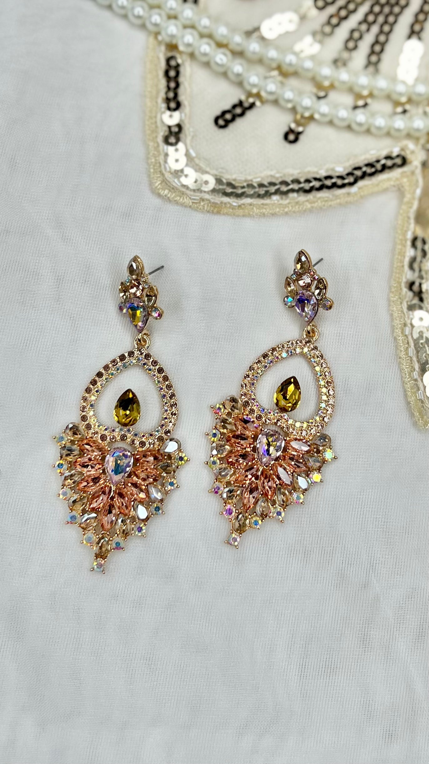 Gatsby Earrings - Peacock: Shop our stunning range of Gatsby inspired dangle earrings. Each pair is decorated with rhinestones ready to help you sparkle the night away
Material: alloy
Length:  - Ciao Bella Dresses 