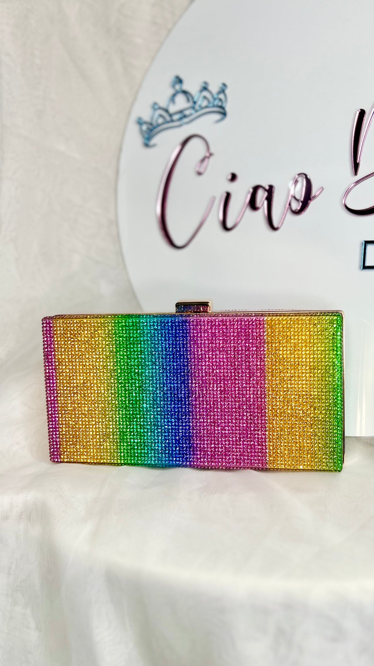 Alina Evening Bag | Ciao Bella Dresses | The Alina Evening Bag has all the colour and sparkle one could dream of. This bag will bring any outfit to life
Features:

Top clasp
Gorgeous block rainbow pattern
T