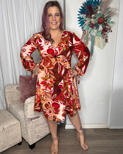 Yasmin Secret Garden Dress: The Yasmin Secret Garden Dress is the perfect addition to your winter wardrobe. Featuring a beautiful floral print, cute detailing at the bust and wrists in a drop w - Ciao Bella Dresses 