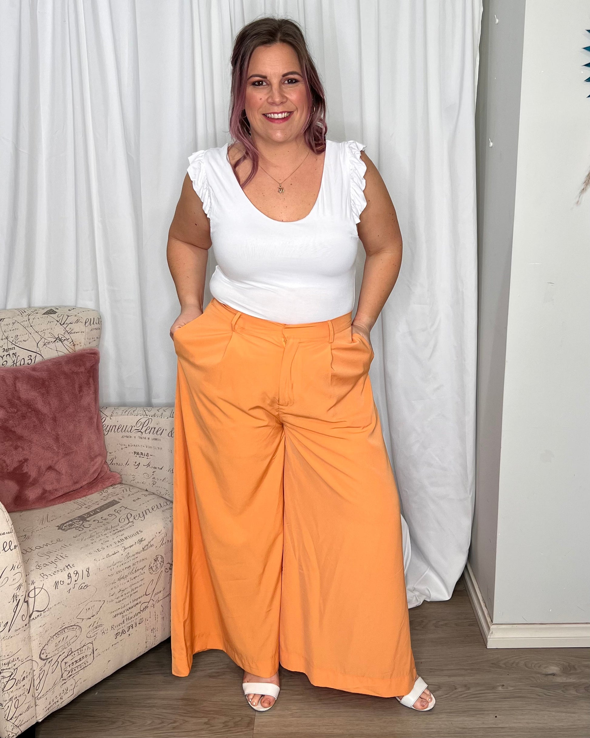 Lillian Palazzo Pants - Melon | Sass Clothing | The Lillian Palazzo Pants are a stunning shape to take you from office to after hours, year round. The pleats at the top streamline into a wide leg for the utmost in