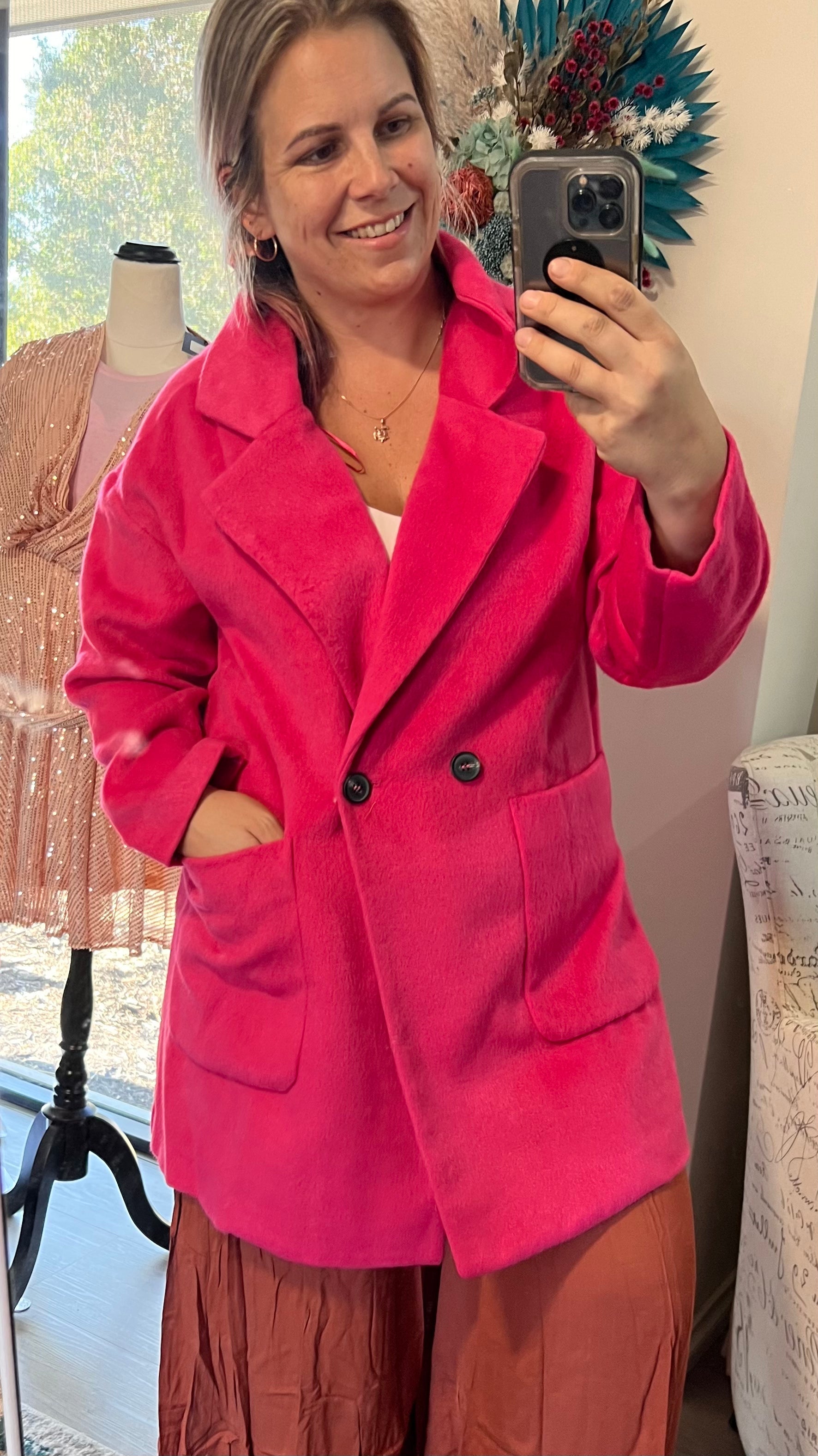 Arden Double Breasted Coat - Hot Pink | Sass Clothing | 
Feast your eyes on the Arden Double Breasted Coat, featuring a heritage vintage design with a button-up front and pockets to stash your lipstick and phone. This coa