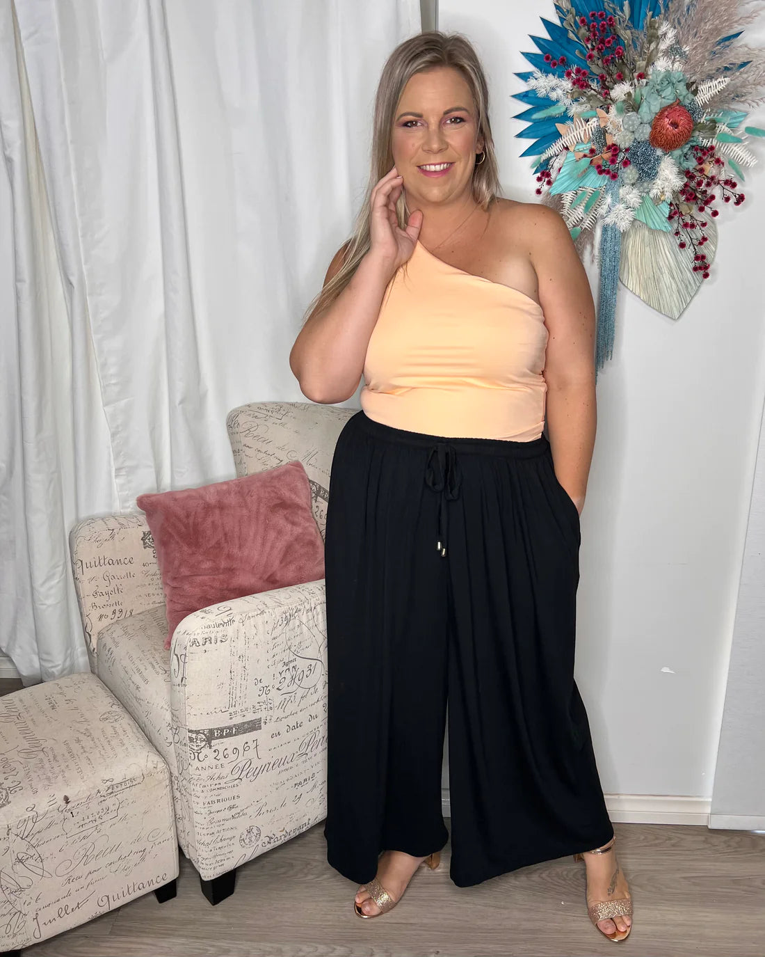 Bec One Shoulder Top: 

The Bec Top is here and sure to become a fast wardrobe staple in an array of core basic and fun pop colours. Style with basic denim or dress up with a maxi or penc - Ciao Bella Dresses 