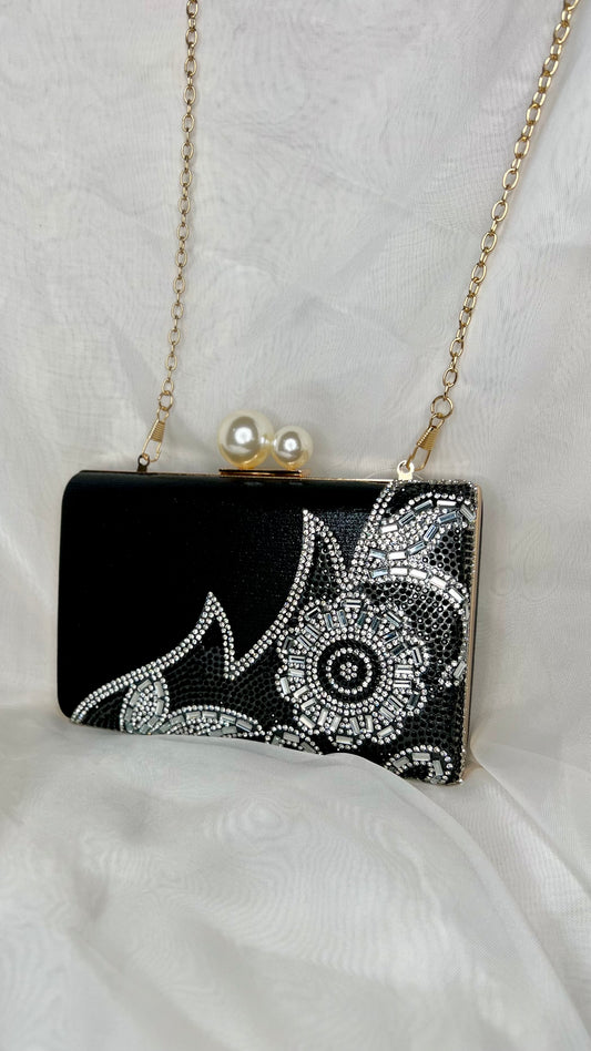 Baguette Evening Bag | Sassy Duck | Unusual and eye catching, this convertible clutch bag is also lovely to hold.
Dimensions: W 17cm X D 4.5cm X H 11.5cm
Handle Drop: Gold link chain extends to 116cm, 