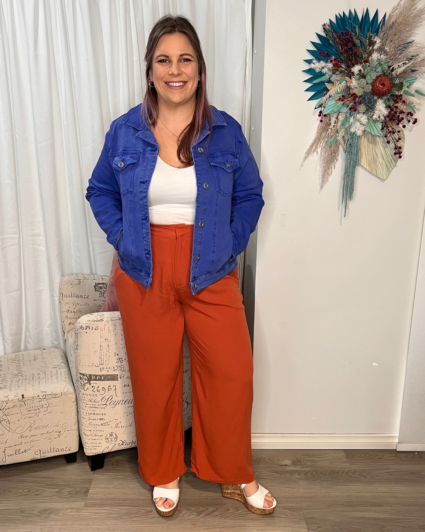 Vivienne Wide Leg Pants - Terracotta | Sass Clothing | Step into style and comfort with the Vivienne Wide Leg Pant! Featuring soft tailoring and a chic, wide leg design, these pants are the perfect choice for keeping you