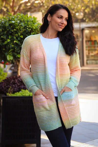 Delilah Rainbow Knit Cardigan: Delilah Rainbow Knit Cardigan is a vibrant and cheerful addition to any wardrobe! The unique and colorful design is sure to turn heads and make you feel like a ray o - Ciao Bella Dresses 