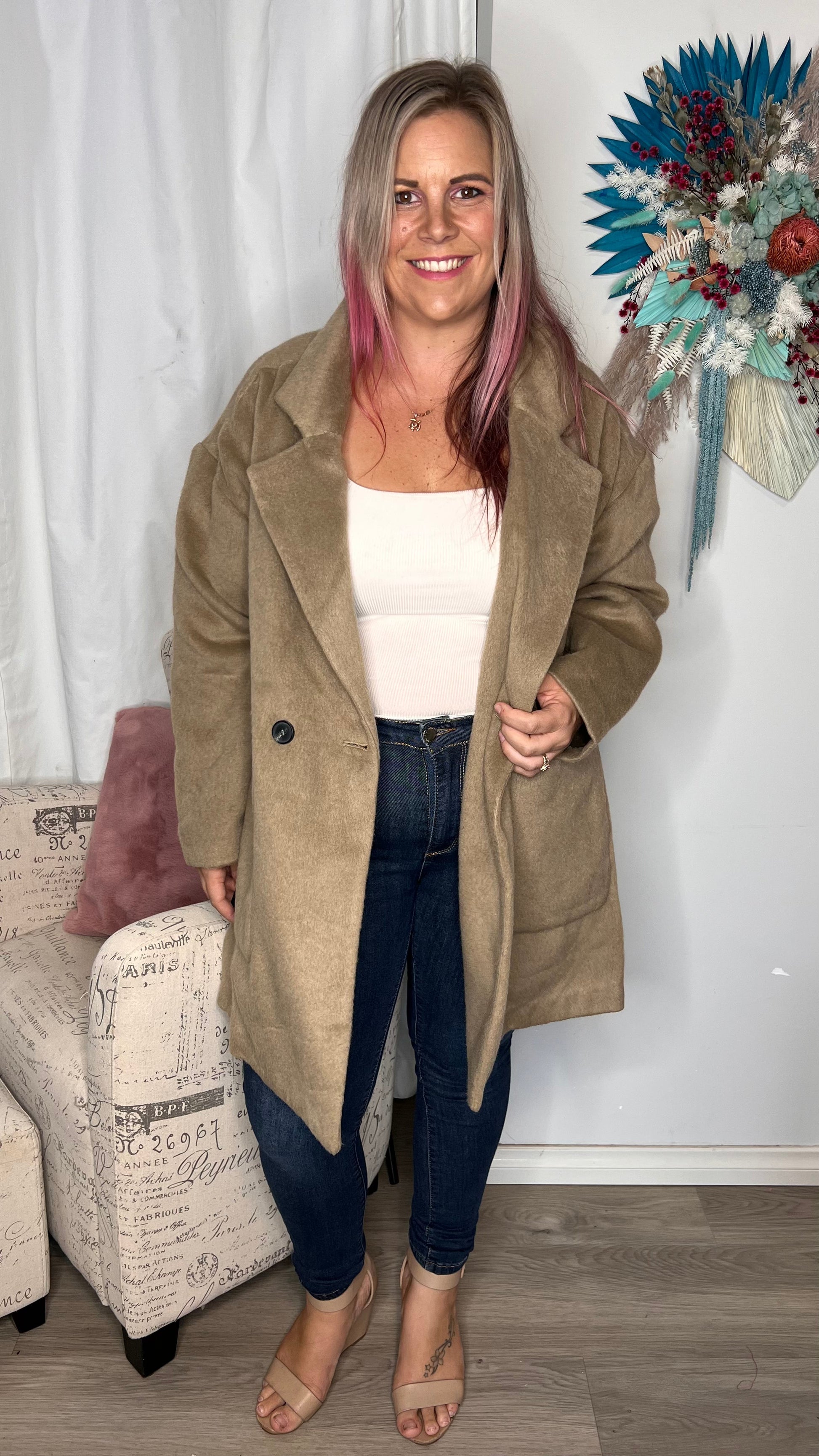 Arden Double Breasted Coat - Tan | Sass Clothing | 
Feast your eyes on the Arden Double Breasted Coat, featuring a heritage vintage design with a button-up front and pockets to stash your lipstick and phone. This coa