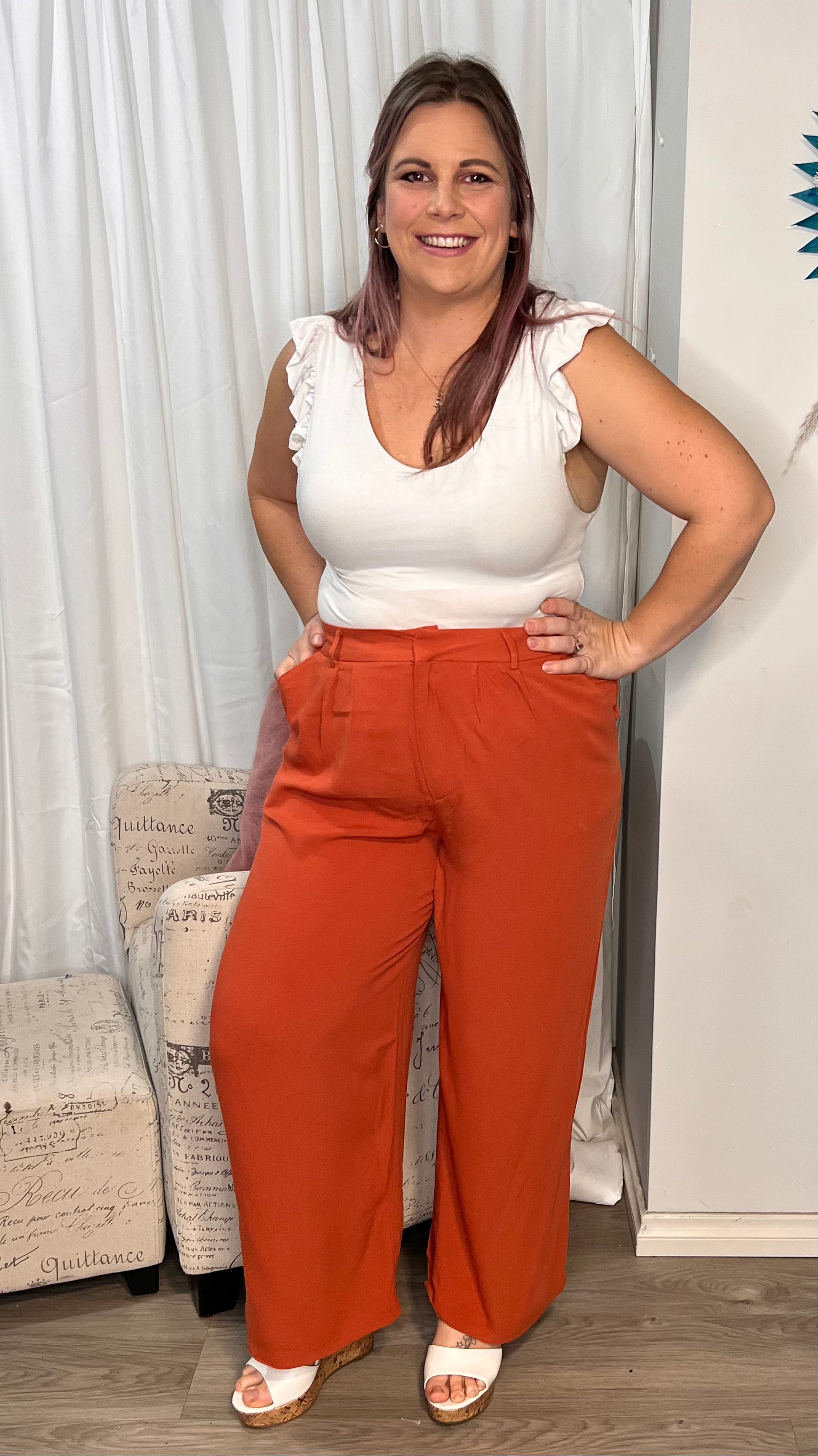 Vivienne Wide Leg Pants - Terracotta | Sass Clothing | Step into style and comfort with the Vivienne Wide Leg Pant! Featuring soft tailoring and a chic, wide leg design, these pants are the perfect choice for keeping you