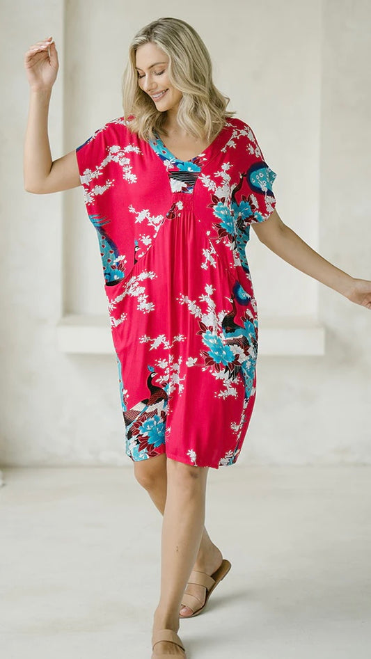 Coastal Dress: 
Achieve a casual, effortless look that is oh-so comfortable. The Coastal Dress is a cocoon shape with an elastic bust detail and concealed pockets
Colour is : Pink  - Ciao Bella Dresses - Freez