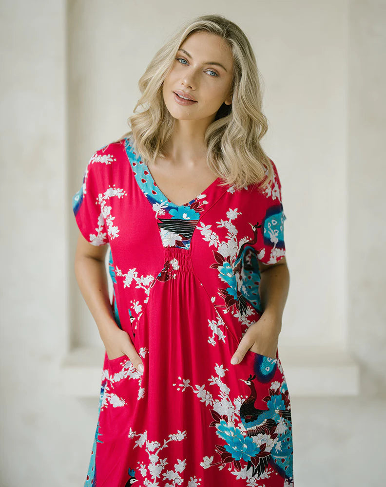 Coastal Dress: 
Achieve a casual, effortless look that is oh-so comfortable. The Coastal Dress is a cocoon shape with an elastic bust detail and concealed pockets
Colour is : Pink  - Ciao Bella Dresses 