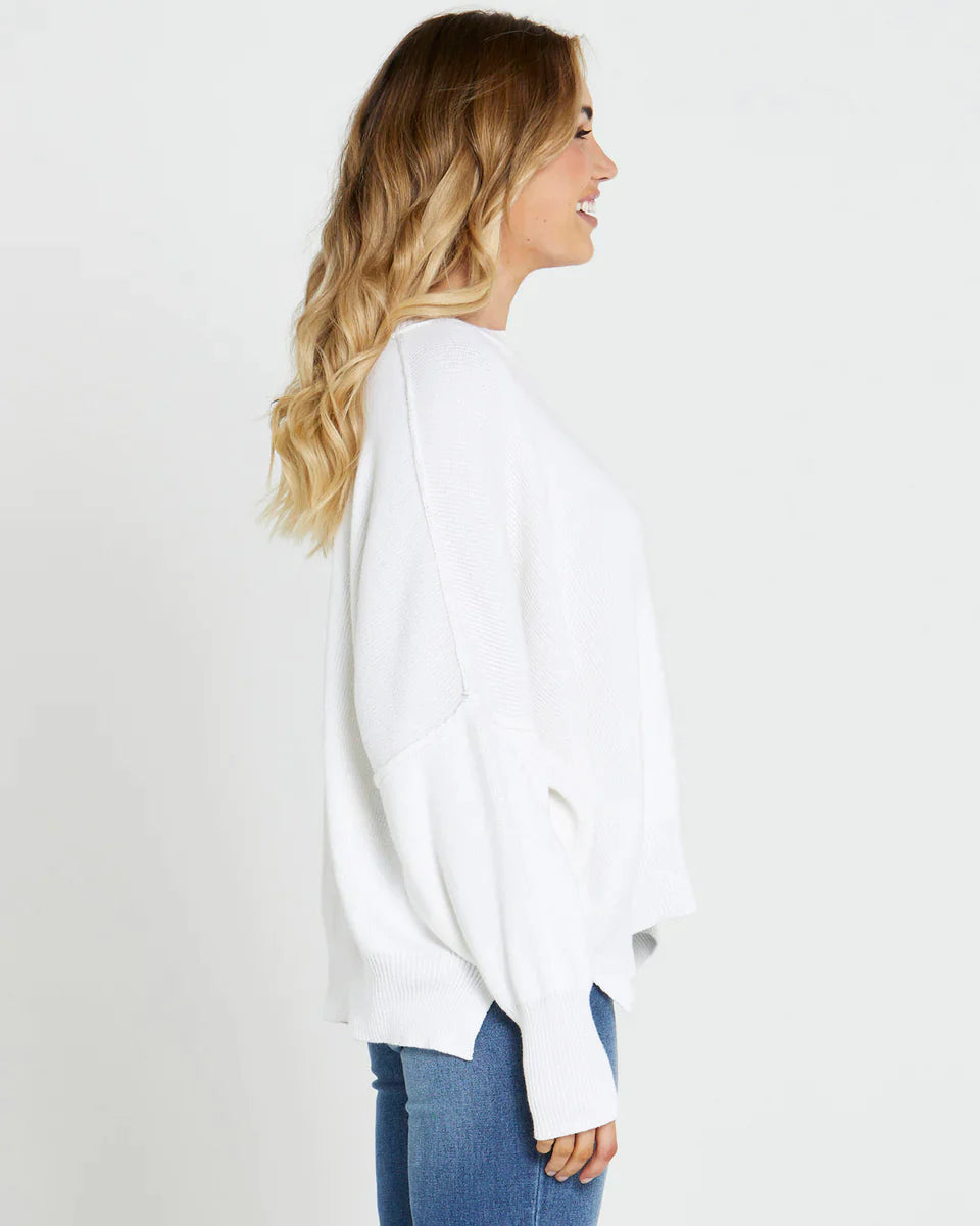 Marie Oversized Knit Top: Hey girl, ready to get cozy and cute? Meet the Marie Oversized Knit Top - your new BFF for lazy days and chill nights. Oversized is IN, so embrace those comfy vibes  - Ciao Bella Dresses 